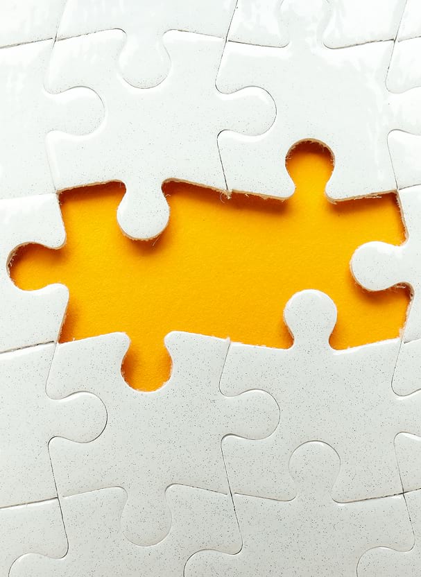 Puzzle image symbolizing system integration and missing connections being aligned